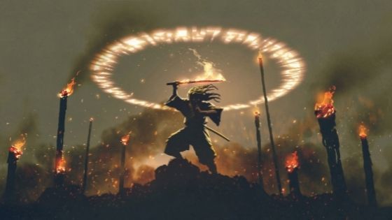 Man standing on a mound under a fiery circle and his sword on fire